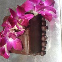 Orchid Cake There was problem after problem with this cake. too much for such a small cake. hahabut it turned out ok. :)it's a chocolate mud with...
