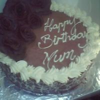 12 Inch Chocolate Cheesecake With Chocolate Collar And Chocolate Candy Clay Roses 12 inch chocolate baked cheesecake with a chocolate collar. decorated with fresh cream and chocolate candy clay roses.i think my roses are...