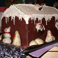 Second "gingerbread" House Cake Here is the slightly less colorful twin of the other "gingerbread" house cake. They were both four layers tall and mighty heavy...