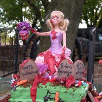 Barbie's Revenge I saw the origional of this on cake central and almost died! It's a doll with a cake skirt in a grave yard. So of course I wanted to...