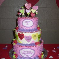 Love Is... I sat down with a class of 1st graders and we designed this Valentine's Day cake. Each student was given a paper heart that said, &...
