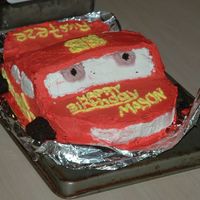 Lightening Mcqueen My son's 3rd birthday chocolet and strawberry cake with whipped cream frosting
