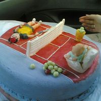 Tennis Court I made this cake for a friend's grandfather who always comment's tennis matches on tv, and dislikes particulary one tennis player...