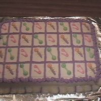 Baby Shower This cake was made during the Easter season. The client wanted a simple baby shower cake with Easter colors. It was for a baby shower at...