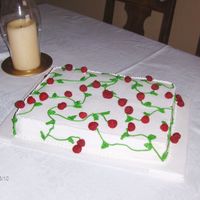 March_2007_004.jpg I've seen versions of this cake and wanted to make one. This cake is white chocolate torted with raspberry buttercream filling.