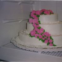 My First Cake This was my very first attempt at a wedding cake, good thing it was for my own wedding. All made with Buttercream. This was a Wilton course...