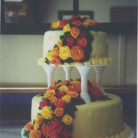 Final Cake For Wilton Course 3 I covered cake with yellow fondant and buttercream roses....toothpicks work great for keeping the roses on the sides.