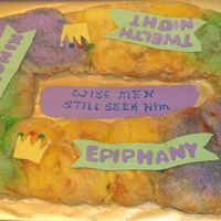 Mardi Gras King Cake This is a New Orleans King Cake to celebrate the Three Wise Men and the Epiphany. The cake is decorated with a sugar glaze and colored...