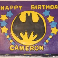 Batman This is a cake I made for my nephew's 5th birthday party. The decorations are all done in fondant and the cake is butter cream...