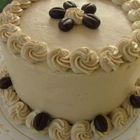Almond Cake with espresso buttercream and fondant coffee beans
