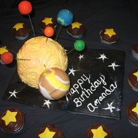Solar System Used the spots ball pan for the sun. Planets are styraphome balls covered in fondant.