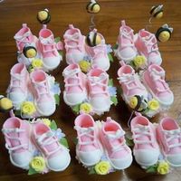Cakes-2009_874.jpg Made these baby shoes for my cousin's baby shower. Shoes are made of fondant.