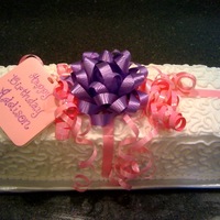 Addison's Gift Yellow cake, buttercream frosting, gift bow & ribbon, 11" x 15" pan, cut in half & stacked