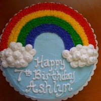 Ashlyn's Rainbow 10" white cake, buttercream frosting. Based this on a Wilton method cake I did in either course 1 or 2.