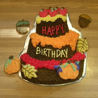 Autumn Birthday Joint birthday cake for me and my brother. Wilton topsy-turvy pan and decorated sugar cookies. I like this pan because it's got the...