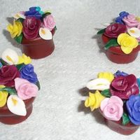 Mmf Flower Pots I made these miniature flower pots for a cake I have to do in a couple of weeks. They're about 2 inches tall. I'm just starting...
