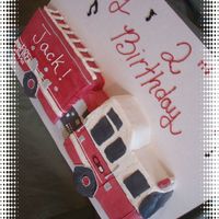 Fire Truck A white cake with choc. mousse filling decorated with SMBC.