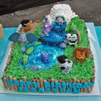 Zoo Cake I copied this idea from another Cake Central member for my son's 2nd Birthday. I simplified it by using dyed coconut for grass and I...