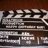 Movie Marker Take 40 Birthday cake ordered as a movie marker, Birthday girl is turning 40 and she wanted a movie theme. Made yellow cake, BC Frosting and used...