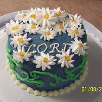 Spring Birthday The request for this cake was blue, green, and springy. I hope that it fits! This was my first time with daiseys, there not as easy as they...