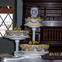 40Th Anniversary Hummingbird, buttermilk devil's food and white cakes covered in crusting cream cheese frosting with artifical flowers. It's not...