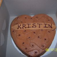 Chocolate Heart This is a Butter Chocolate cake covered in chocolate BC with a strawberry filling. The name is wrote on fondant. I didn't notice how...