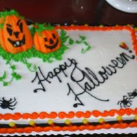 Happy Halloween! 1/2 sheet white cake with buttercream frosting.