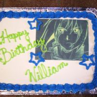 My Youngest Son's Birthday Cake chocolate and white &frac14; sheet ice cream cake with butter cream frosting, edible image