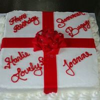 April Birthdays White cake, butter cream frosting, fondant ribbon