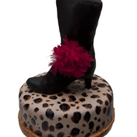 Leopard Print And Boot Cake First attempt to work with RKT..... will try to have less "bumps" next time :) RKT boot with black BC fondant, atop hazelnut...