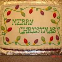 Very Simple Christmas Cake This is a cake I did for my office Christmas party. It was kind of last minute, but I thought it came out cute.