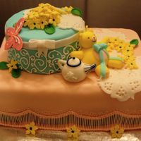 Baby Shower Cake Specialty cake using fondant for detail work. Everything is edible!
