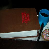 New Home Party 9x13 cake, cut in half and stacked. Covered with fondant. Mug, pen, donut and note pad made of fondant. Liquid in mug made from colored...