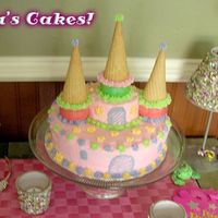 Castle Cake This is one in a set of 3 pictures from my daughter's 1st birthday party. I had only had my 1st class from Wilton where I learned the...