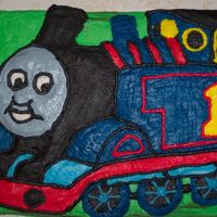 Thomas The Tank I did this birthday cake for the 4 yr. old son of my doctor. This was a hard cake to make because the Thomas pan has been discontinued....