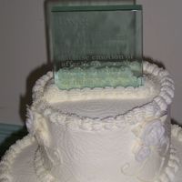 My First Wedding Cake Veiw Ii This is the top and the novelty piece. The cake topper was a three pound PAPER WEIGHT with a description of "Love" as an...