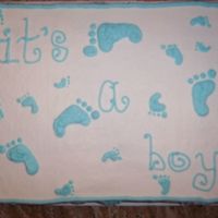 Top Feet I Vanilla Cake with vanilla BC. Baby feet are piped with different sized dot tips.
