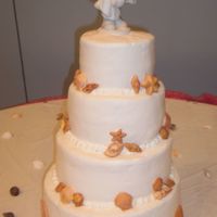 Colleen's Wedding I Vanilla cake, vanilla BC. orange colored sugar for a "sandy" effect. This cake went through an ordeal. It traveled all the way...