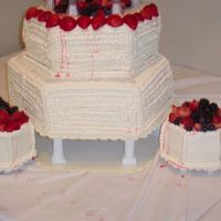 Megan's Wedding I This is the bottom half of my sister's wedding cake. The cake was vanilla with white chocolate cream cheese "frosting". She...