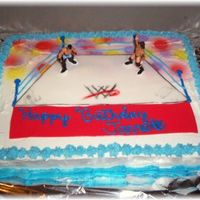 Wrestling Cake the cake was frosted with buttercream, the mat was done in fondant, the WWE on the ring was handpainted , the poles ropes were done with...