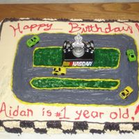 Race Track First Birthday Cake This is the second cake i made and decorated myself. I got the idea from an American Baby magazine (i think.....). Took me awhileto make...