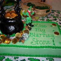 Leprechaun Cake This is a half sheet with vanilla cake and vanilla SMBC filling and icing. The pot of gold is molded out of rice crispie treats and the...