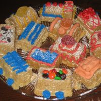 Train Cakes Using The Williams Sonoma Train Cake Pan By Nordic Ware. Used recipe included with the pan, used egg substitute instead of eggs. BC icing with candy in the hopper car wells. The cake wasn't...