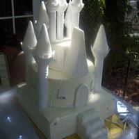 Cakecompress.jpg 50/50 icing with some fondant accents. We really liked what someone else had done here and used it as our guide! I added the lights and...