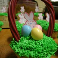 Bunny Cupcakes Yellow cake. BC icing. Hershey's Chocolate Eggs. Flavoured Twizzlers. Say the idea in the galleries.