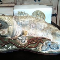 Hunting/fishing Cakes Large Mouth Bass....used a toothpick to texturize the large fin and tail...used a gripper pad to give the texture to the body....brushed...