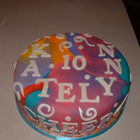 Tie Dye Swirl Birthday Cake This was such a fun cake to do for a girl who was turning 10. I just made up a few colors of fondant, swirled them together and rolled them...
