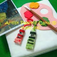 Artist Palette Walnut buttercake covered in white gumpaste to depict a blank canvas. Paintbrush, palette and paint tubes are all made with gumpaste.
