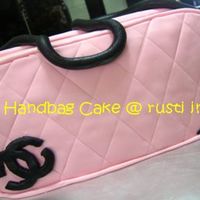 Handbag Cake My first handbag cake made for my daughter's 19th birthday. It's a strawberry yoghurt buttercake filled with cherry-buttercream....