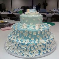 Baby Shower Boy My first sale cake!!! :) for a boy baby shower, buttercream frosting fondant baby, booties and flowers. TFL!!